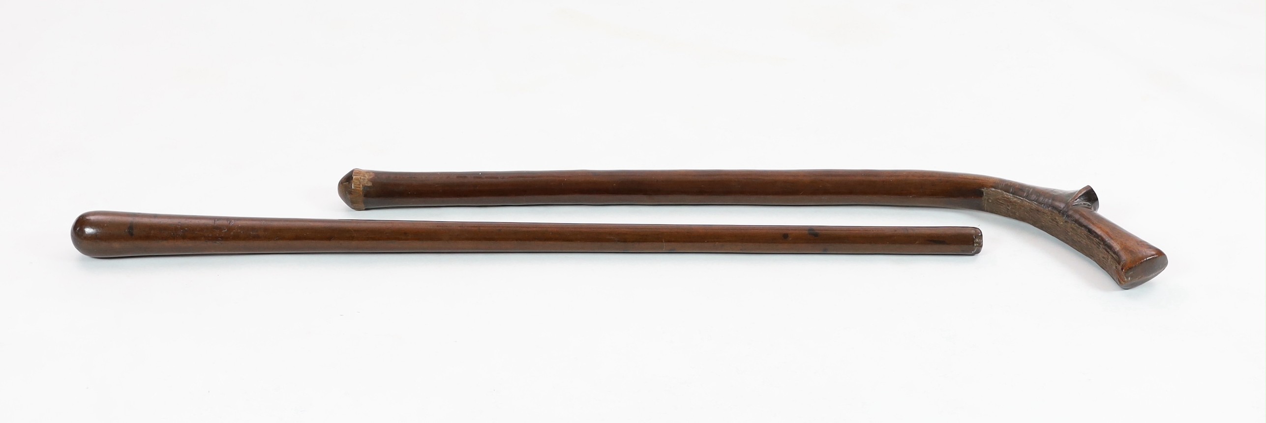 Two Tongan hardwood war clubs, 87cm and 96cm long